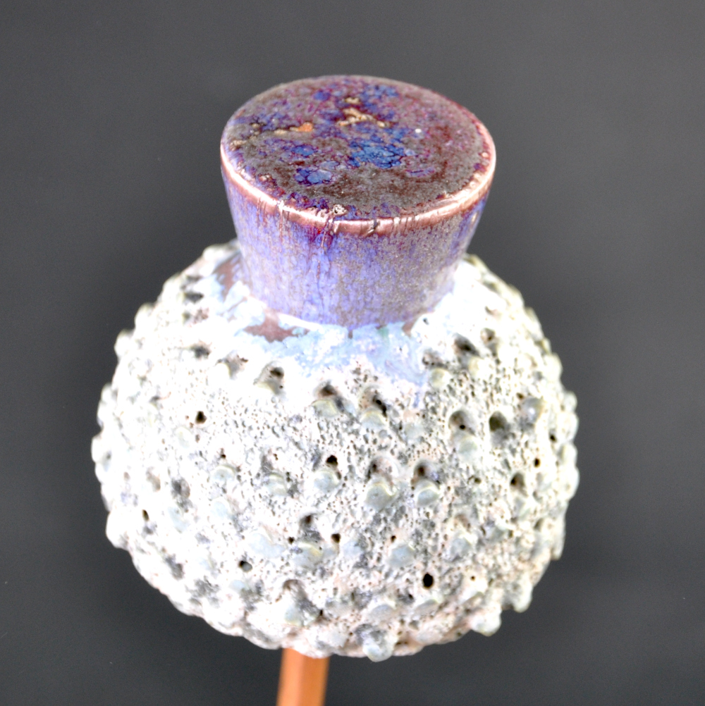 Ceramic Thistle with highly textured green body and purple flower