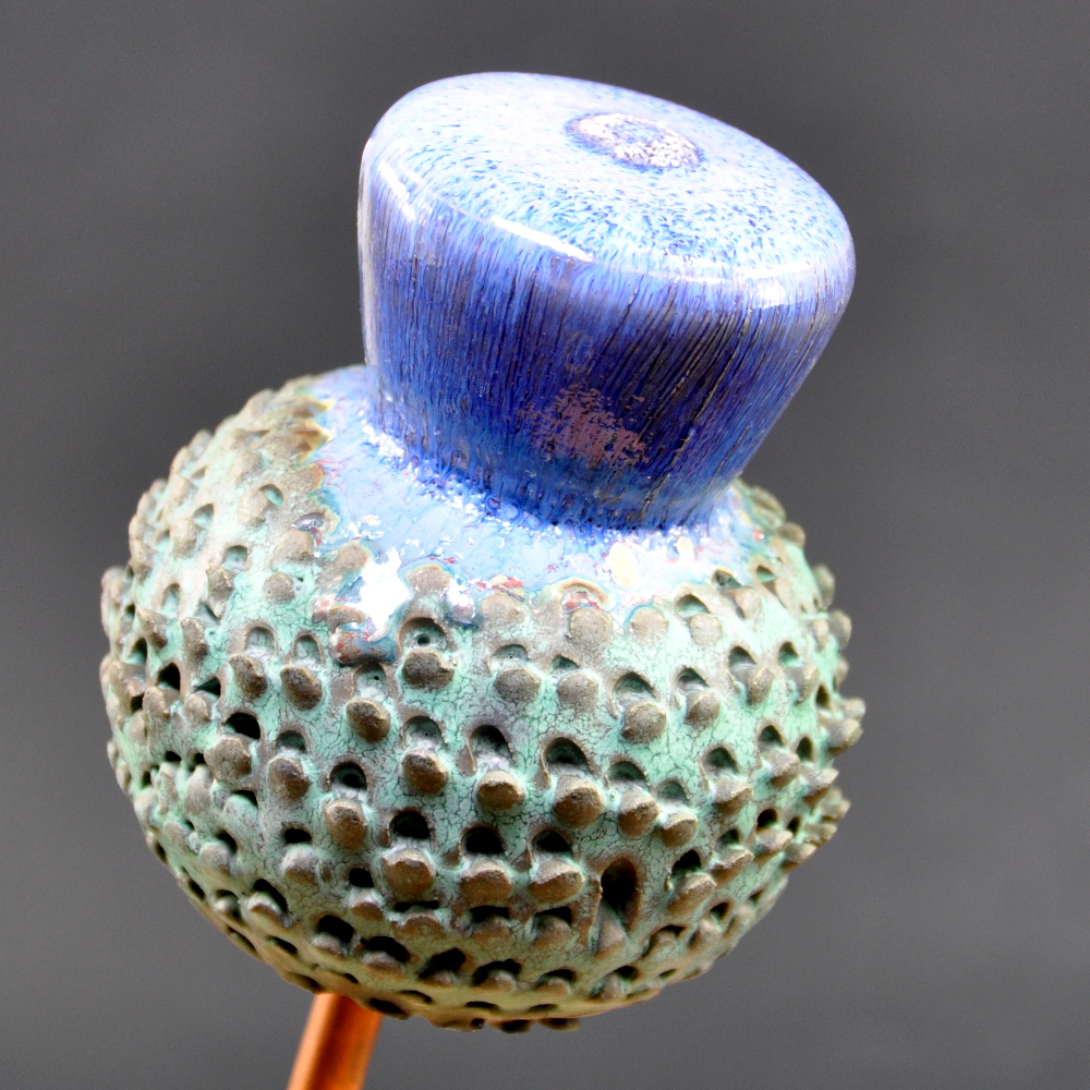 Ceramic Thistle with highly textured green body and purple flower