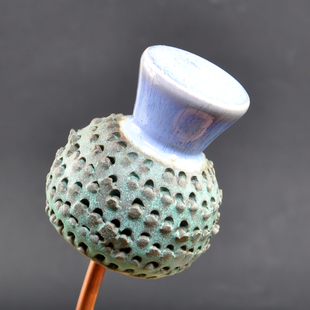 Ceramic Thistle with highly textured green body and purple flower