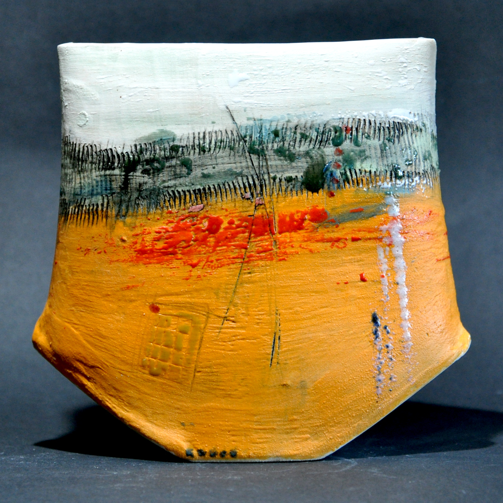 Engobe decorated pivot Vase, decorated with orange and white engobes, glazes, ceramic pencils and wax crayons