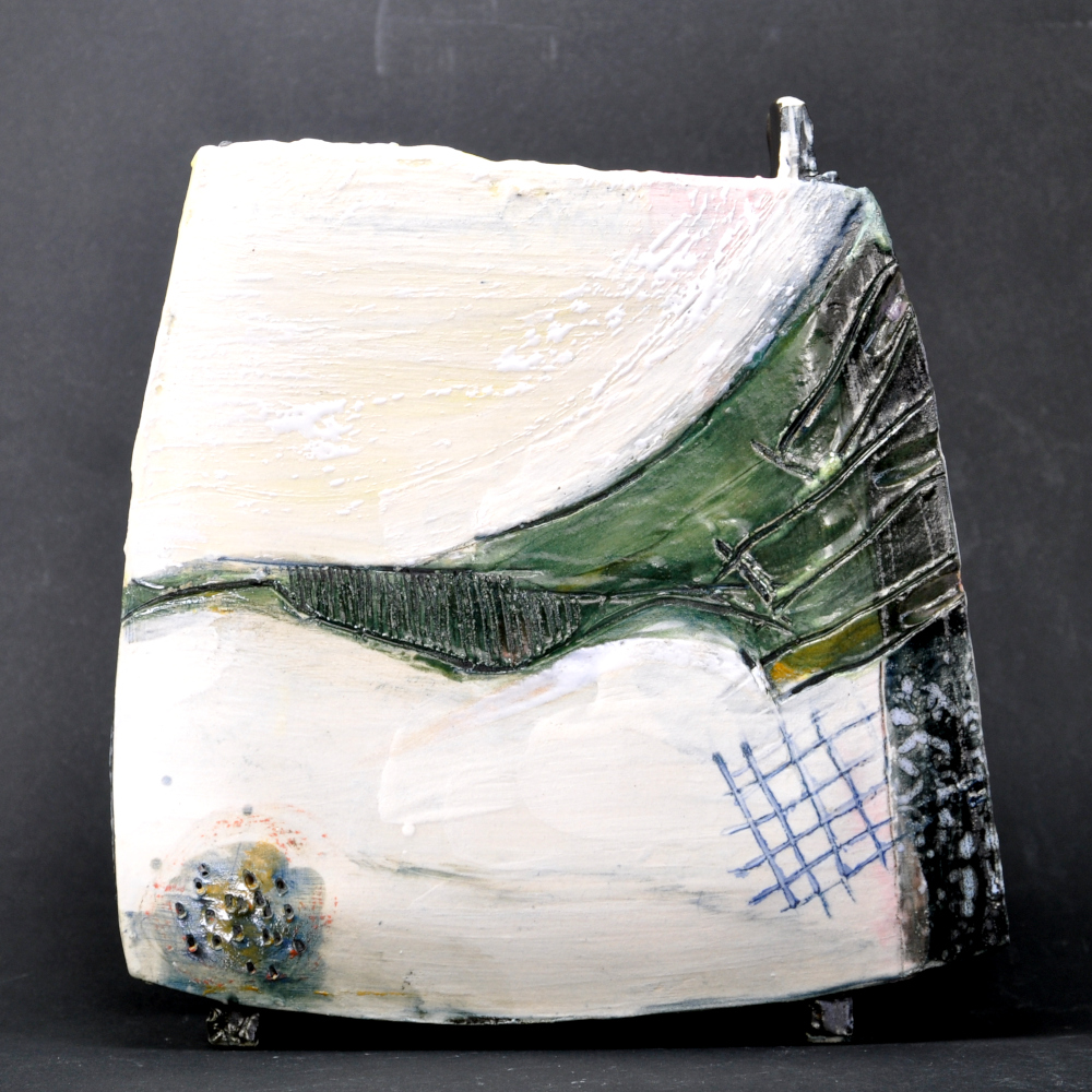 Rectangular slab built vase, decorated with engobes, wax crayons, ceramic ink;