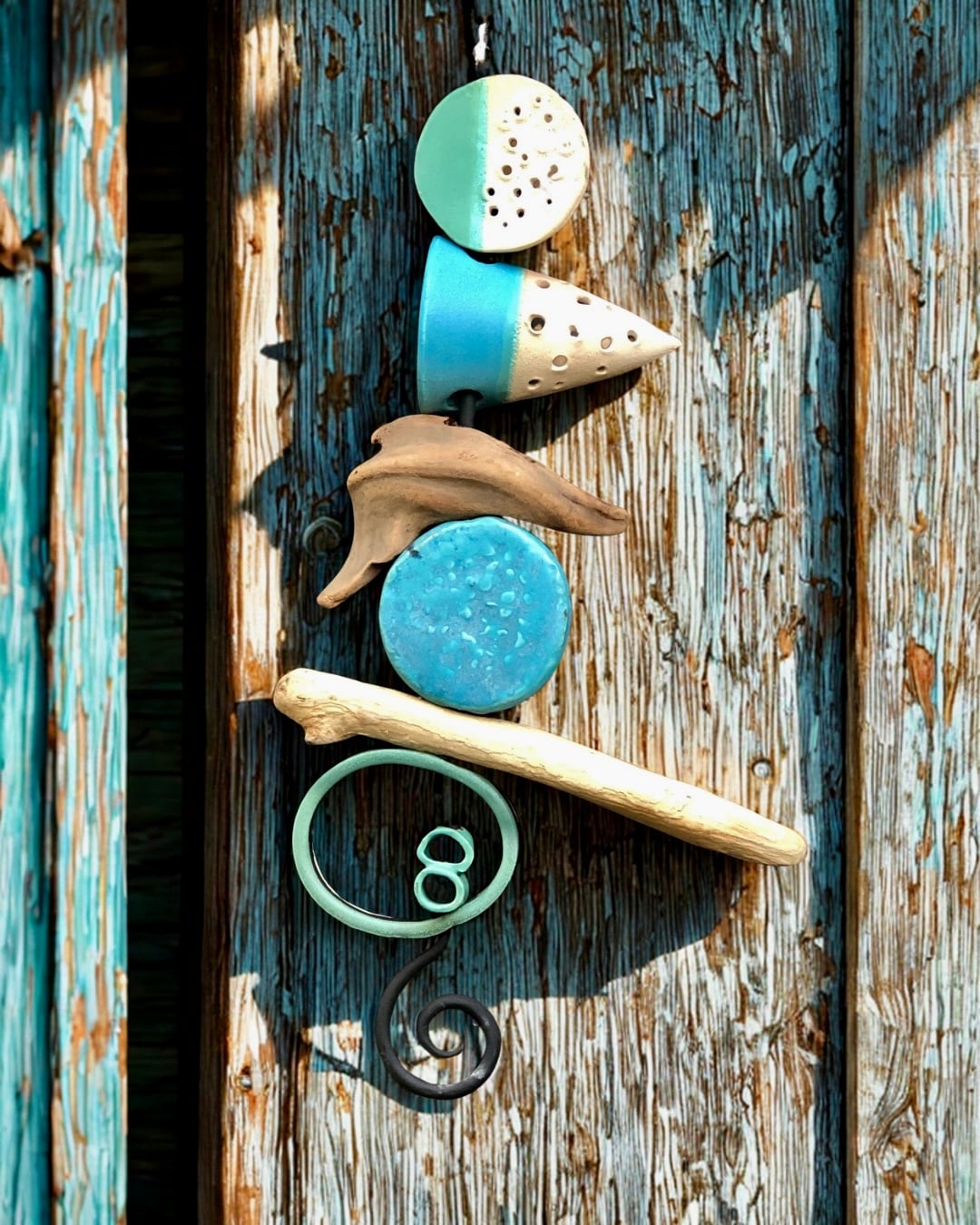 Tidelines: Display against a wooden wall