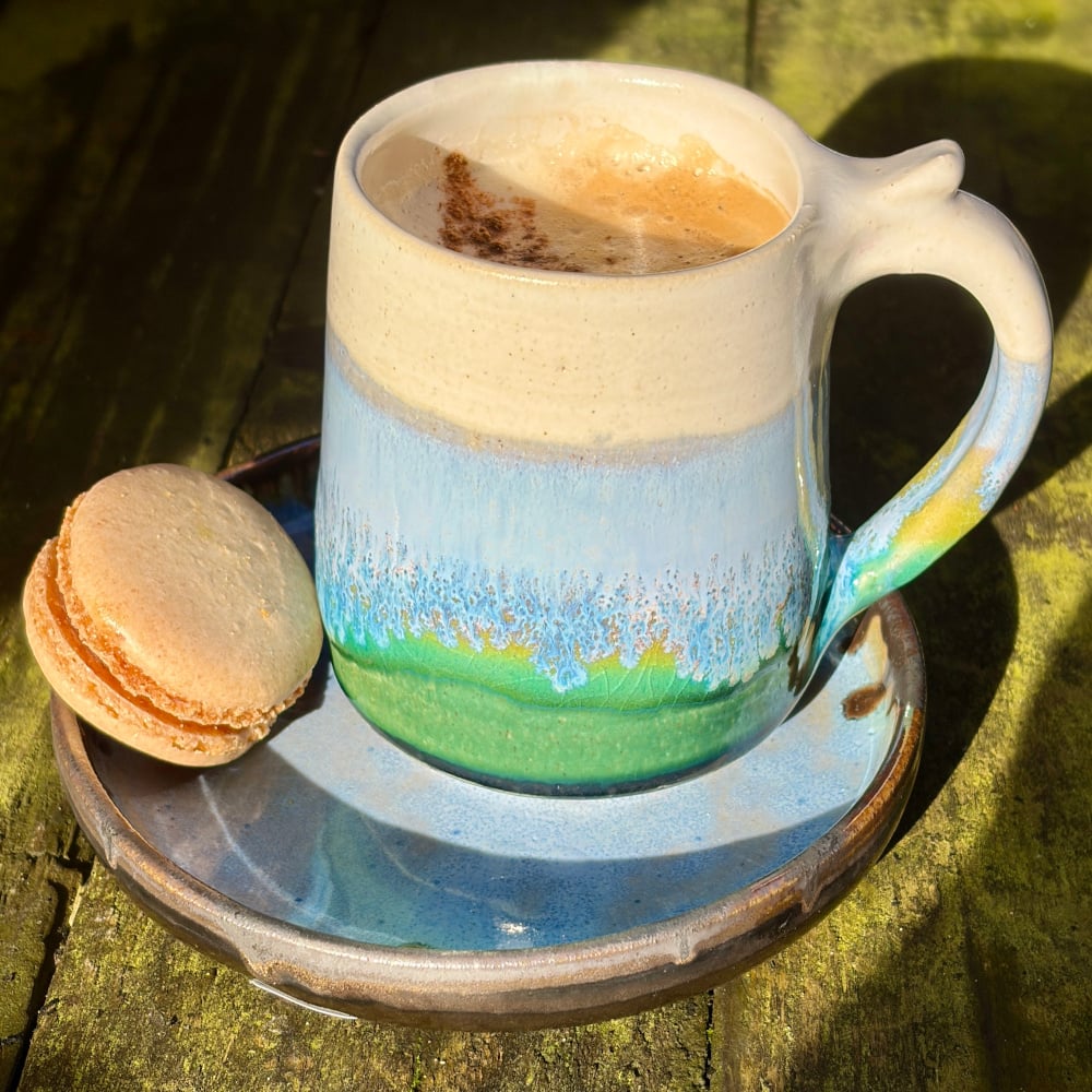 A real treat: Cappuccino in horizon mug and Macaroon