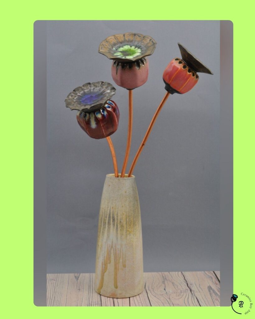 Ceramic Poppy Seed Heads in a Stoneware Vase